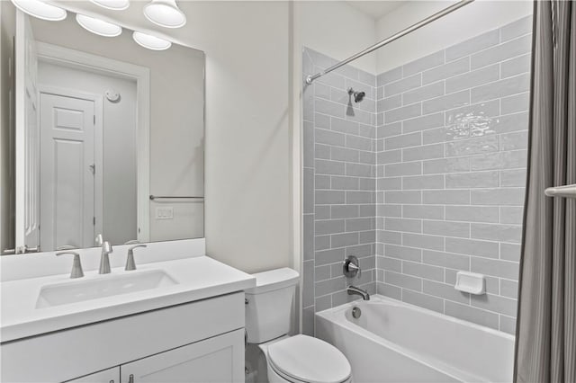 bathroom with toilet, shower / bath combo, and vanity