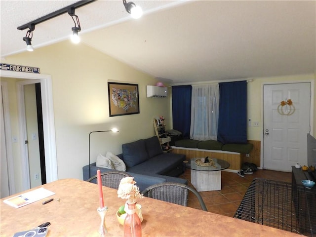 tiled dining area with a wall mounted air conditioner and lofted ceiling