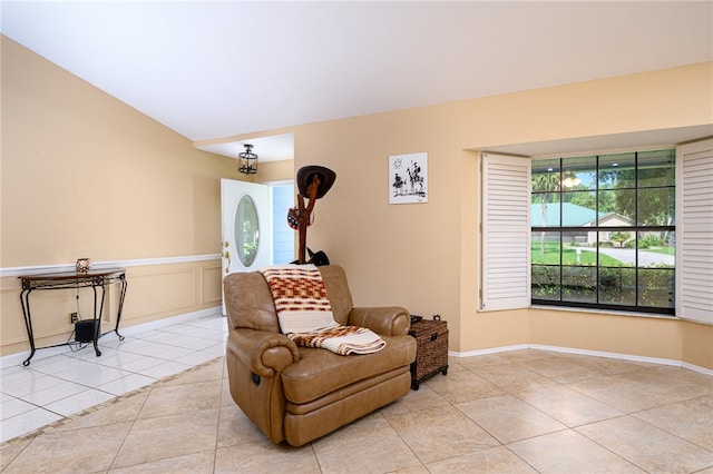 living area with light tile patterned floors