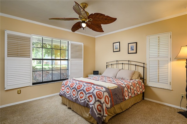 bedroom with carpet flooring, ceiling fan, and crown molding