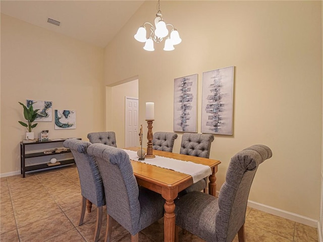 545 Valencia Cir SW, Vero Beach, FL 32968 - dining room with high vaulted ceiling, a chandelier, baseboards, and light tile patterned floors