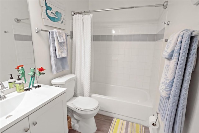 full bathroom with wood-type flooring, vanity, toilet, and shower / bath combo