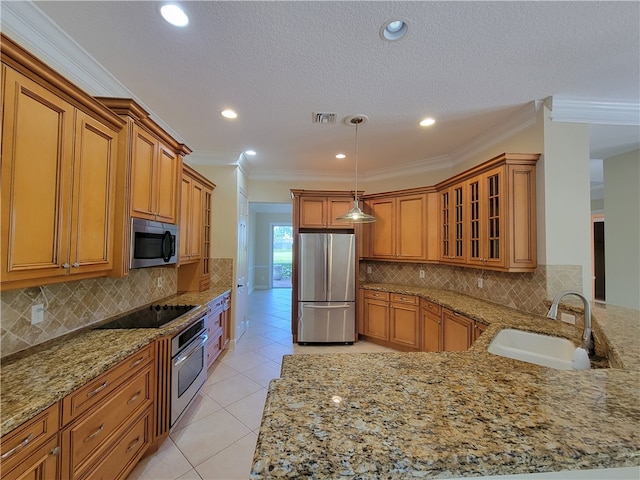 kitchen featuring sink, stainless steel appliances, light stone counters, pendant lighting, and ornamental molding