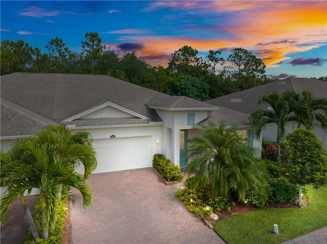 view of front of property featuring a garage