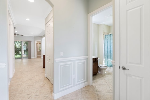 hallway with light tile patterned flooring