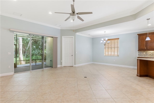 empty room featuring ceiling fan with notable chandelier, light tile patterned floors, and crown molding