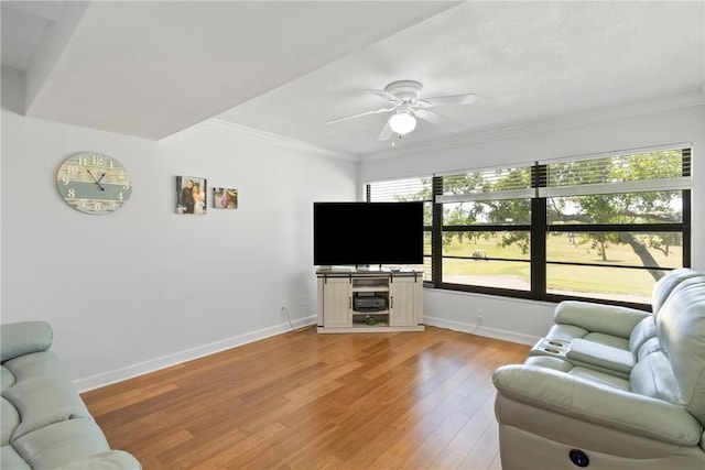 25 Plantation Dr Unit 206, Vero Beach, FL 32966 - living room featuring ceiling fan, ornamental molding, and baseboards
