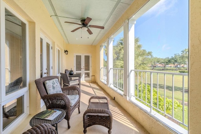 5060 Harmony Cir Unit 204, Vero Beach, FL 32967 - sunroom featuring french doors, ceiling fan, and carpet floors
