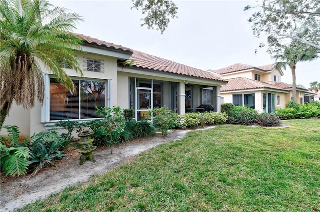 view of front of house with a front lawn