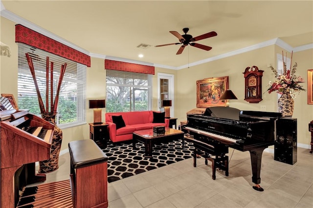 sitting room with ceiling fan, ornamental molding, and light tile patterned flooring