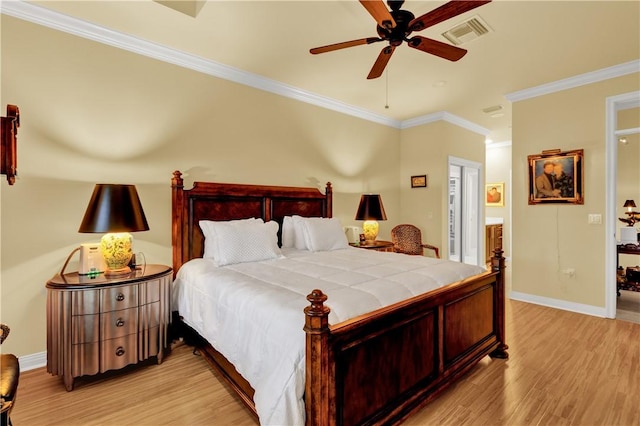 bedroom featuring ceiling fan, connected bathroom, ornamental molding, and light hardwood / wood-style flooring