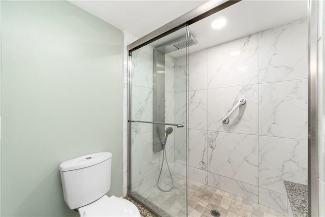 3351 Twin Lakes Ter Unit 106, Fort Pierce, FL 34951 - full bathroom featuring toilet and a shower stall