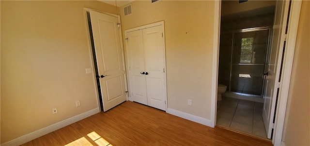 unfurnished bedroom featuring light hardwood / wood-style flooring