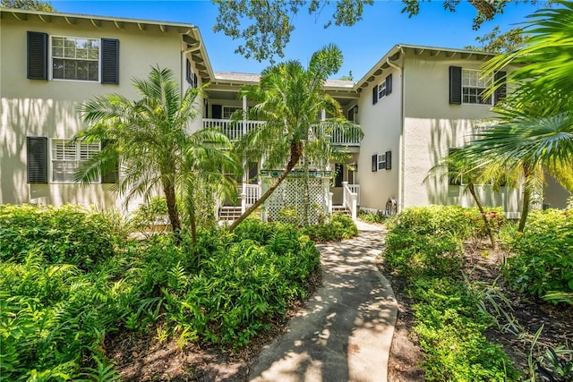 1295 Winding Oaks Cir E Unit 805, Vero Beach, FL 32963 - view of property featuring stairs