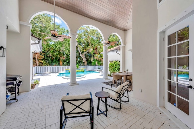 view of patio / terrace featuring ceiling fan