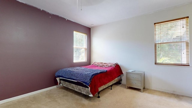 138 Port Royal Ct, Sebastian, FL 32958 - carpeted bedroom featuring a ceiling fan and baseboards