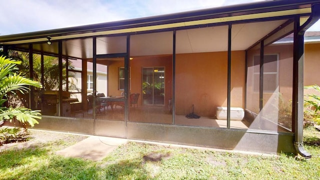 138 Port Royal Ct, Sebastian, FL 32958 - back of house with a sunroom and stucco siding