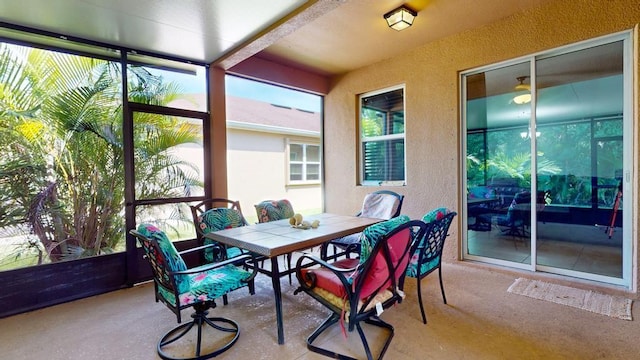 138 Port Royal Ct, Sebastian, FL 32958 - sunroom / solarium with a textured wall and outdoor dining area