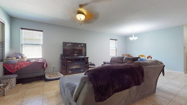 138 Port Royal Ct, Sebastian, FL 32958 - living area with a chandelier, light tile patterned floors, and ceiling fan