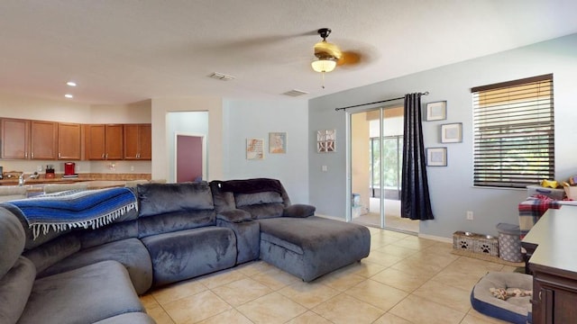138 Port Royal Ct, Sebastian, FL 32958 - living room with ceiling fan, light tile patterned floors, and recessed lighting