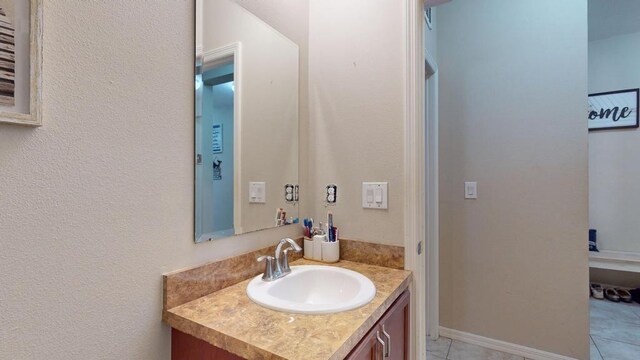 138 Port Royal Ct, Sebastian, FL 32958 - bathroom with vanity and tile patterned flooring