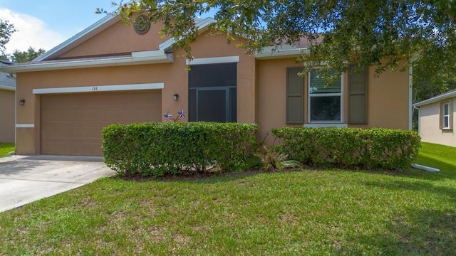 138 Port Royal Ct, Sebastian, FL 32958 - view of front of property featuring stucco siding, a front yard, concrete driveway, and an attached garage