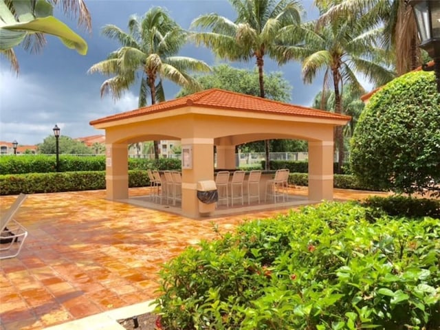 view of home's community featuring a gazebo and a patio area