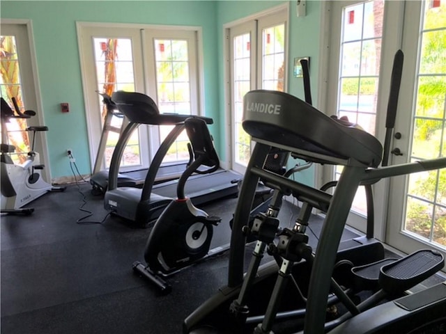 exercise room featuring french doors