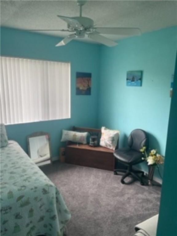 bedroom with carpet flooring and ceiling fan