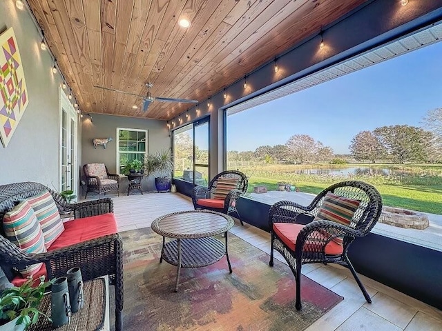 sunroom featuring wooden ceiling