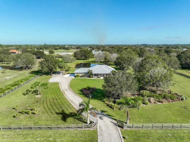 birds eye view of property featuring a rural view