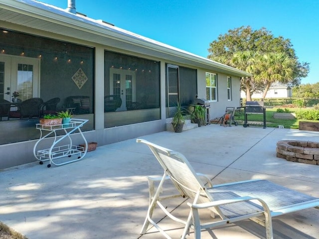 view of patio featuring a fire pit