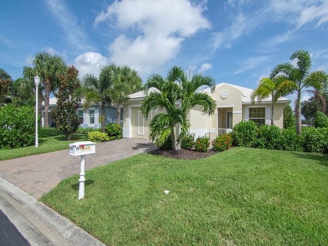 view of front of home with a front lawn