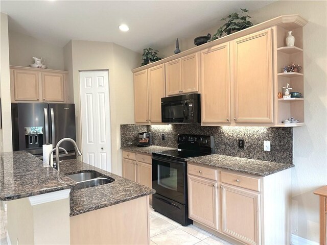 kitchen with tasteful backsplash, sink, light brown cabinets, and black appliances