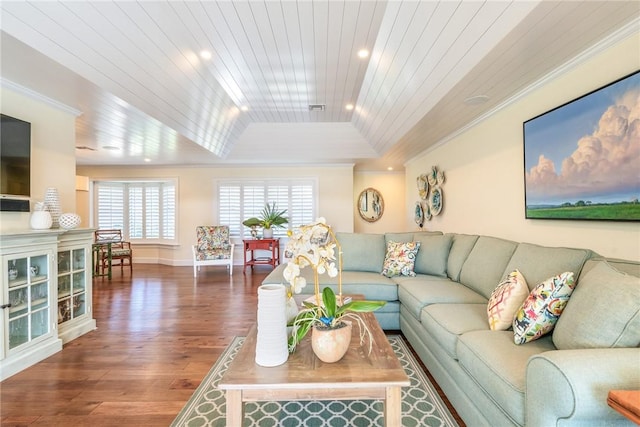 living room with wood finished floors, wood ceiling, crown molding, and a raised ceiling