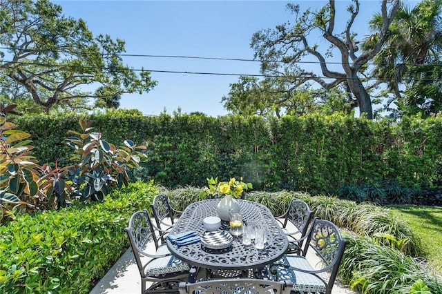 view of patio with outdoor dining area