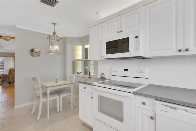 kitchen with pendant lighting, white appliances, white cabinets, ceiling fan with notable chandelier, and light hardwood / wood-style floors