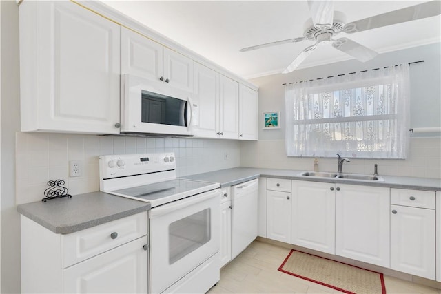 kitchen featuring white cabinetry, sink, ceiling fan, white appliances, and decorative backsplash