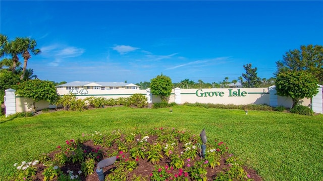 community sign with a lawn