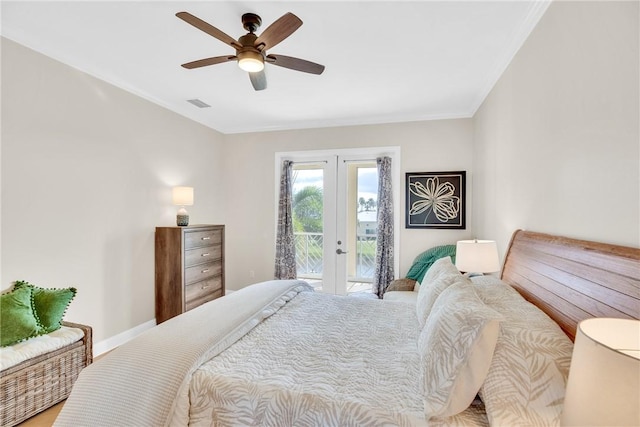 bedroom featuring visible vents, baseboards, access to outside, ornamental molding, and french doors