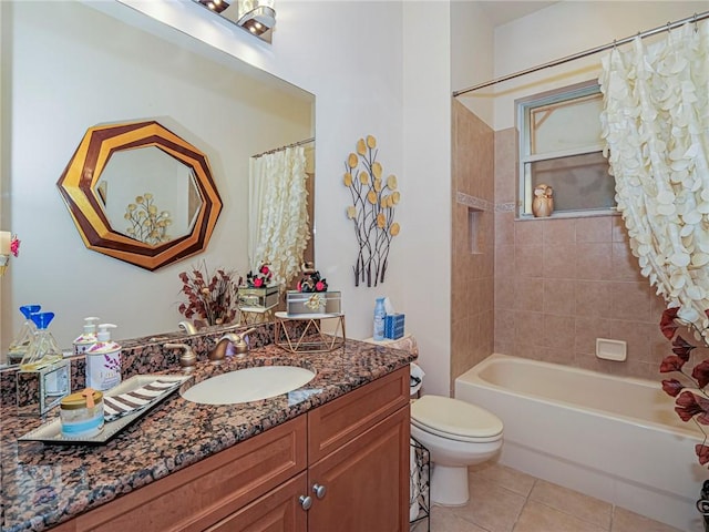 bathroom featuring toilet, shower / tub combo, vanity, and tile patterned floors