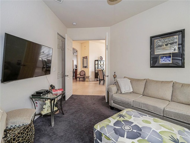 living room featuring carpet floors and tile patterned floors