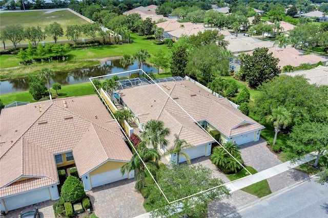 aerial perspective of suburban area featuring a large body of water and property parcel outlined