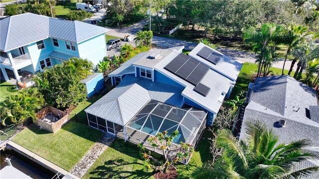 ranch-style home with a garage and a front yard