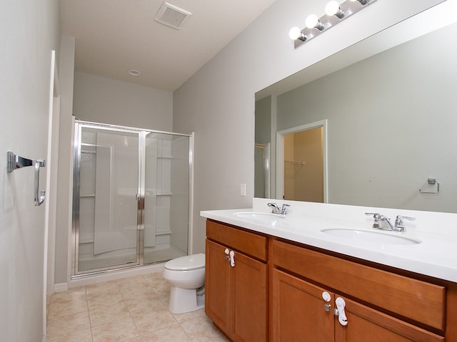 351 Monaco Pl, Vero Beach, FL 32960 - bathroom featuring a stall shower, double vanity, and tile patterned flooring