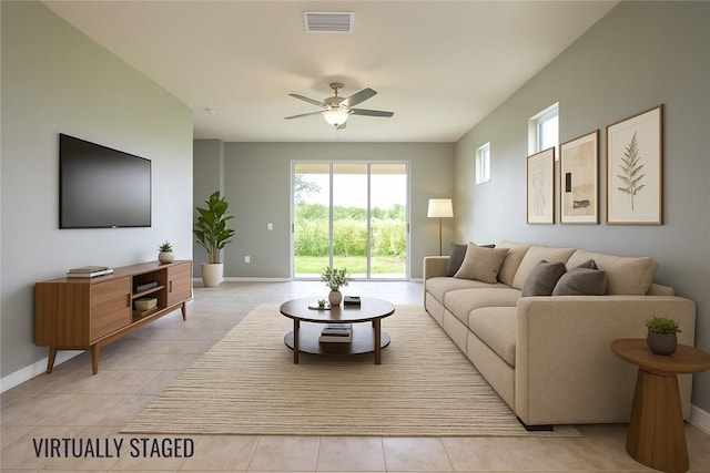 351 Monaco Pl, Vero Beach, FL 32960 - living area with ceiling fan, plenty of natural light, and light tile patterned floors