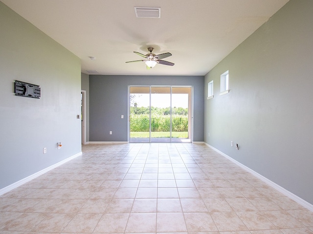351 Monaco Pl, Vero Beach, FL 32960 - spare room featuring a ceiling fan and light tile patterned floors