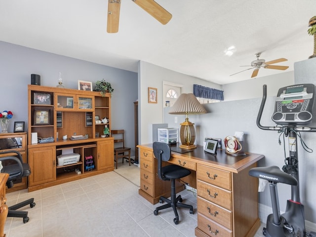 office space featuring light tile patterned floors and ceiling fan