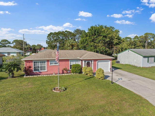 ranch-style home with a garage and a front lawn