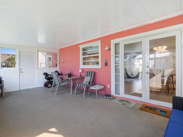 sunroom featuring french doors